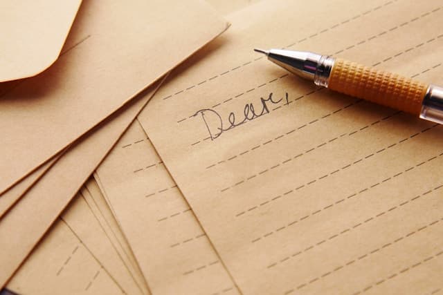 Japan Never Automated Everything. In the Age of AI, That Looks Like Wisdom. A pen resting on top of a handwritten letter beginning with Dear