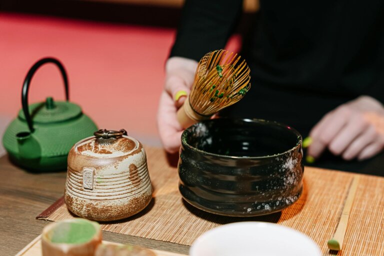 June in Japan Experience the art of matcha tea preparation using traditional bamboo chasen and teapot.