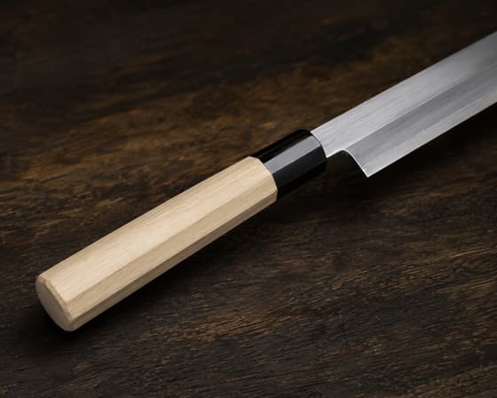 Traditional Japanese wa-handle in magnolia wood, close-up detail