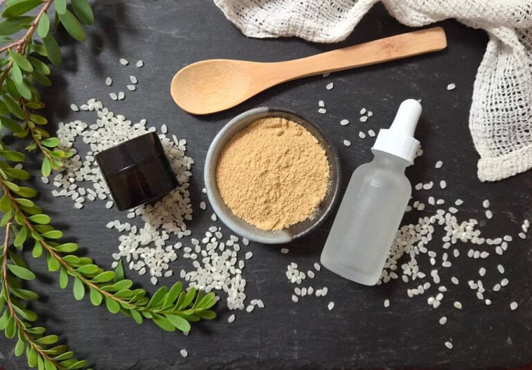 Rice bran and rice on black serving board