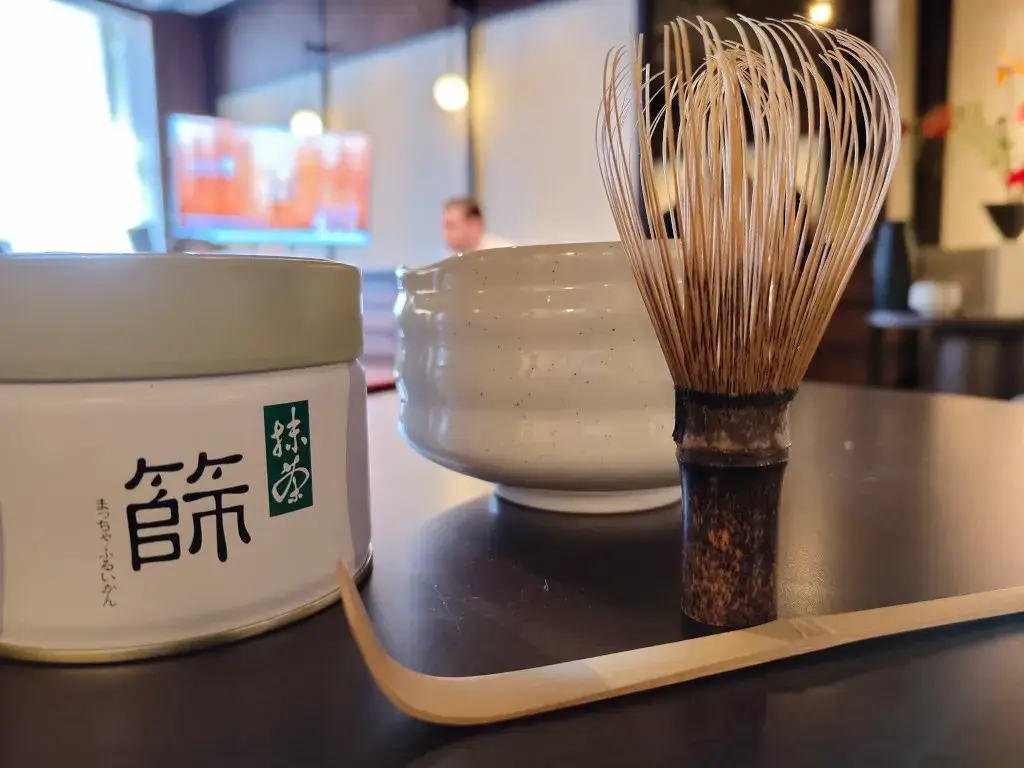 How to Choose an Authentic Japanese Chasen (And Why They're So Hard to Find) Black bamboo chasen whisk being prepared for Japanese tea