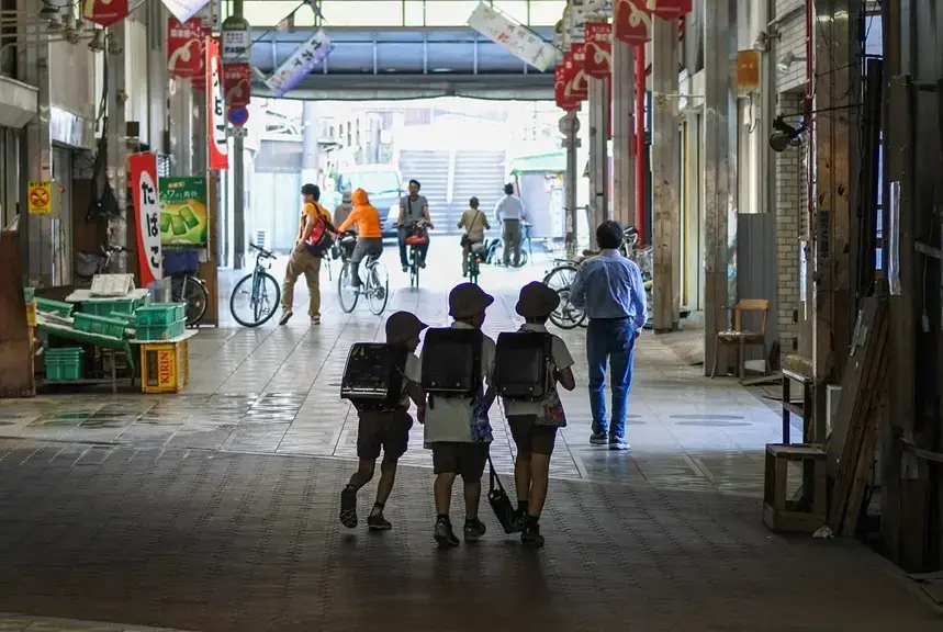 Why Japanese Children Walk to School Alone Three Japanese school backpacks (randoseru) lined up together