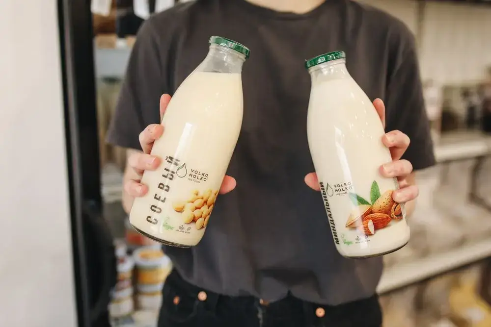 Why Soy Keeps Showing Up in Today’s Biggest Food and Health Trends Soy milk being poured into glass bottles