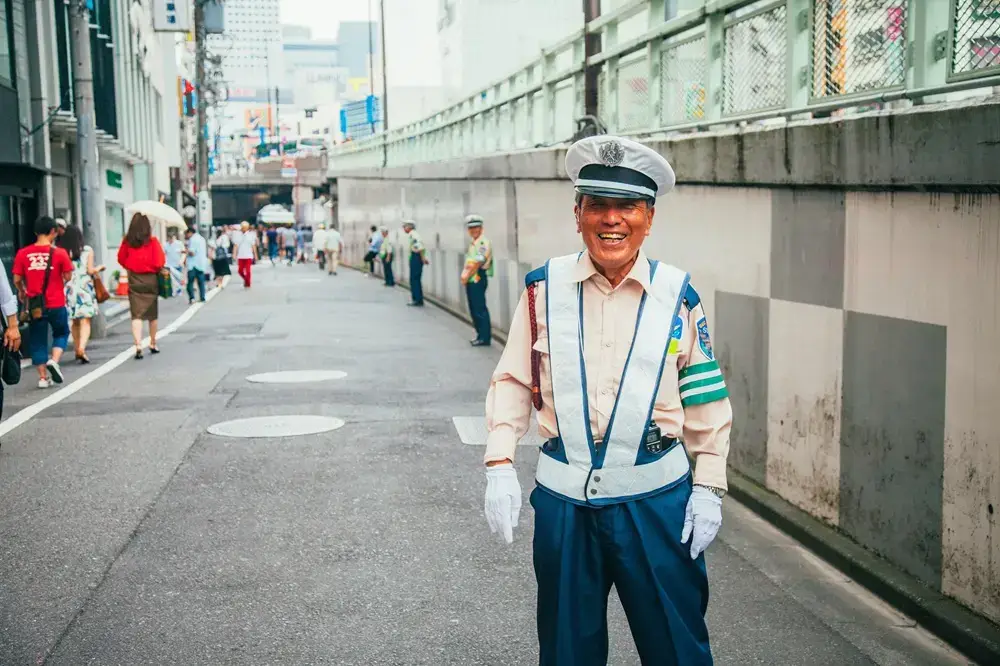 How Japan Thinks About Aging: Purpose, Roles, and the Meaning of Growing Older Older man working in a reflective uniform in Japan